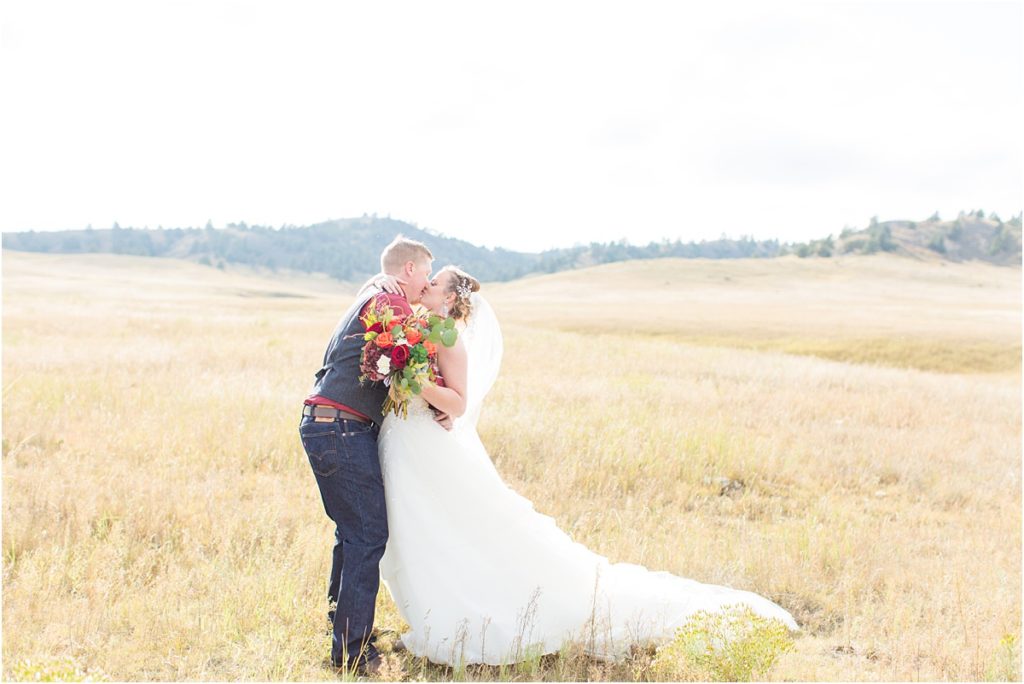 Burgundy & Orange Wyoming Wedding Fall Inspired Bride and Groom Photos