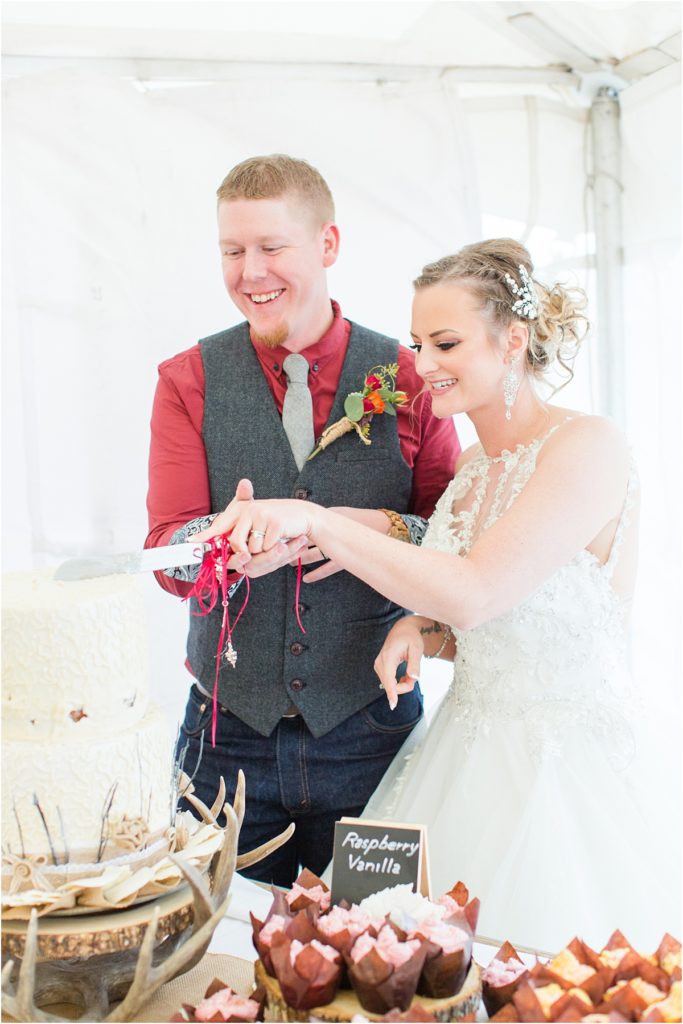 Burgundy & Orange Wyoming Wedding Fall Inspired Bride and Cake Cutting