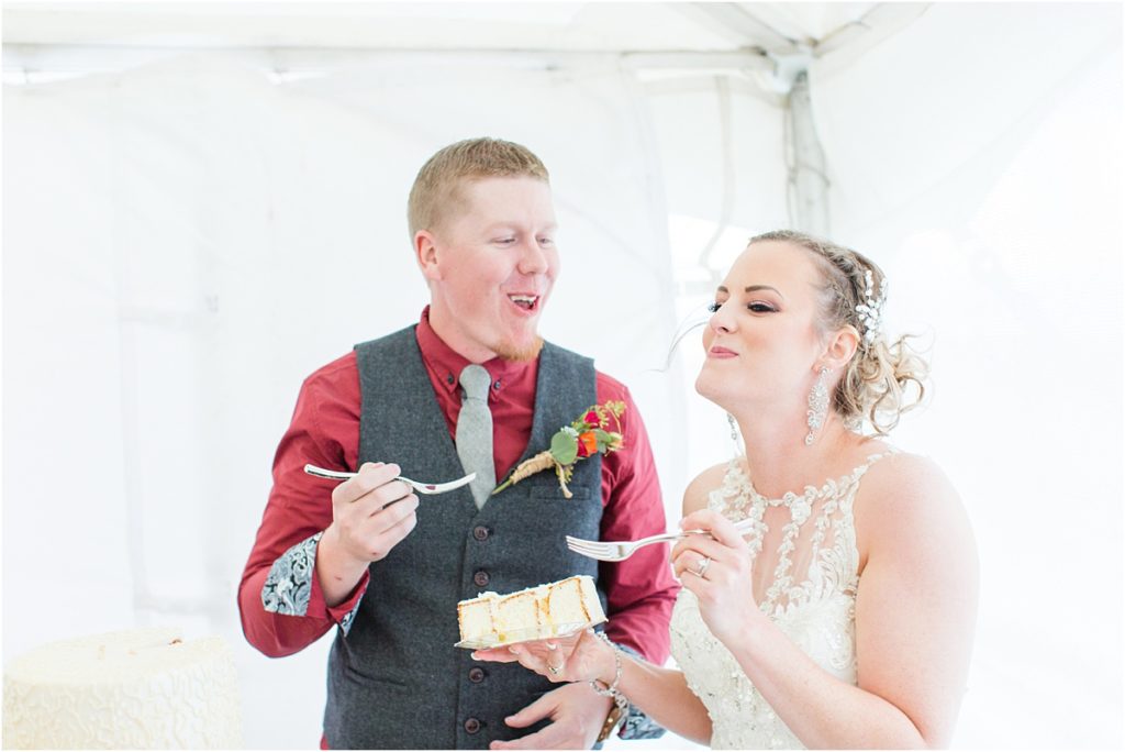 Burgundy & Orange Wyoming Wedding Fall Inspired Bride and Cake Cutting